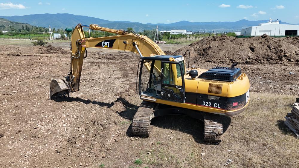 მუხლუხოიანი ექსკავატორი Caterpillar 322 CL